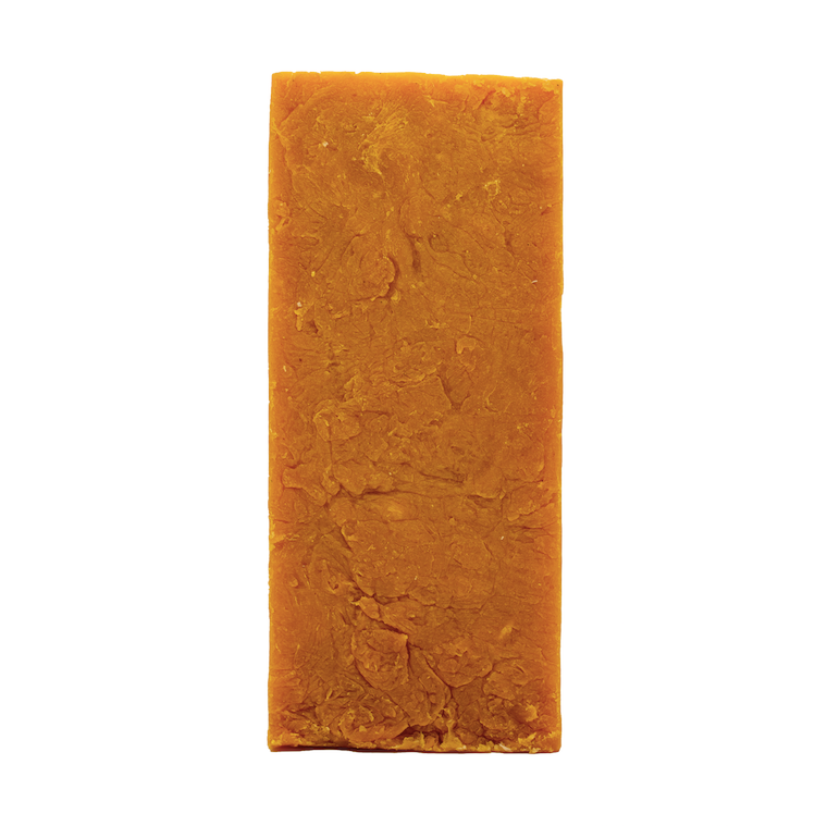 Bright orange soap bar on a white background